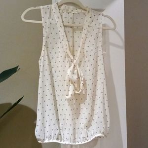 Gray polka dot sleeveless blouse